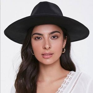 black wide-brim panama hat